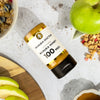 Manuka Doctor Manuka Honey 100 MGO with a bowl of granola and apples